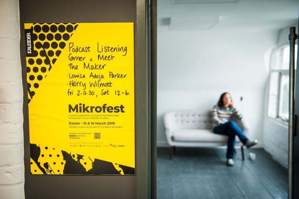 Picture of poster attached to wall for Mikrofest.