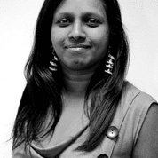 Rupa Chilvers smiles at the camera.