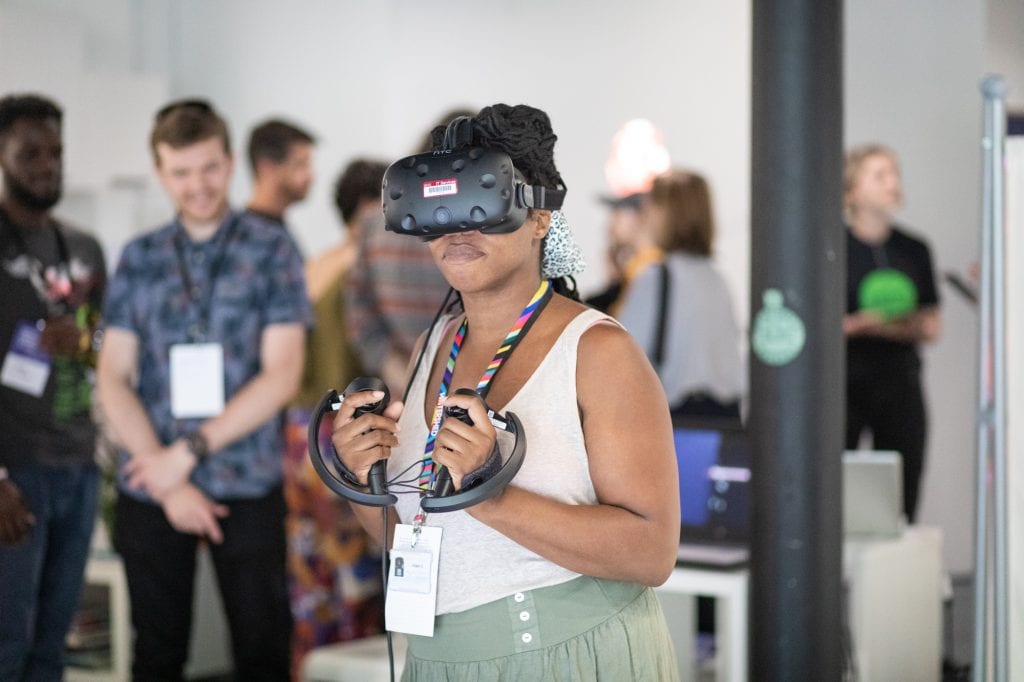 Woman using VR headset at an event at SWCTN Showcase