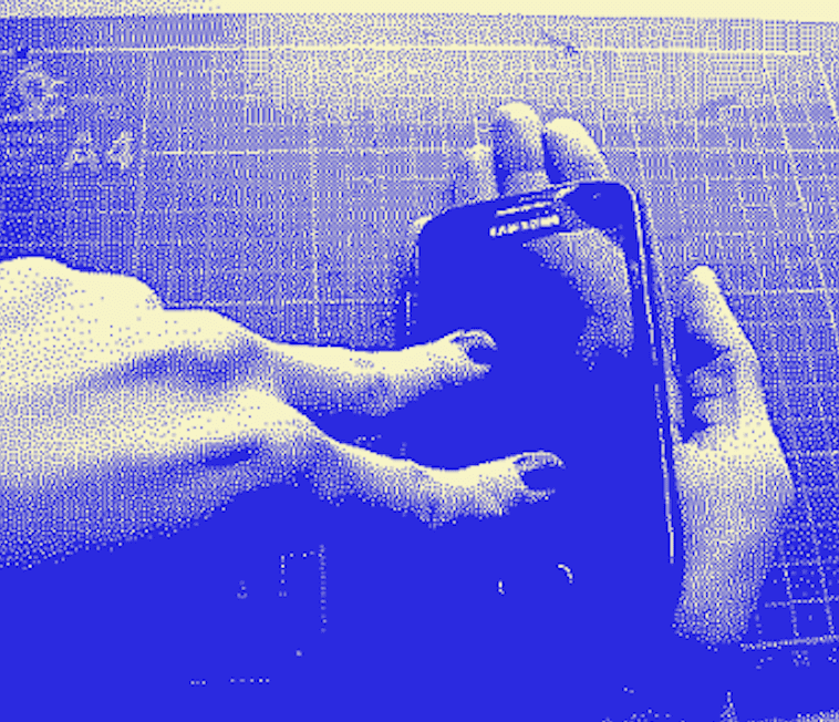 blue filter on image of hands holding a phone flat on a palm. Another hand has 2 fingers resting on the screen