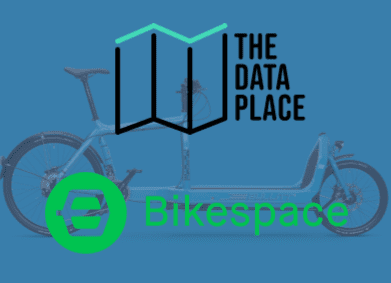 image of a bike on a blue background. the text in front reads The Data Place and Bikespace 